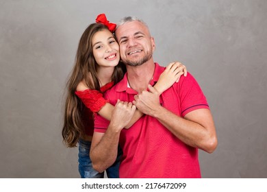 Happy Fathers Day! Happy Caucasian Father And Daughter Hugging On Plain Background With Copy Space