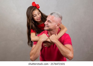 Happy Fathers Day! Happy Caucasian Father And Daughter Hugging On Plain Background With Copy Space