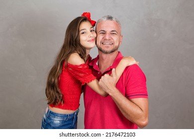 Happy Fathers Day! Happy Caucasian Father And Daughter Hugging On Plain Background With Copy Space