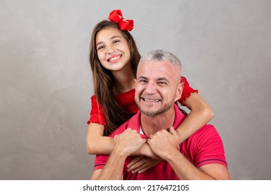 Happy Fathers Day! Happy Caucasian Father And Daughter Hugging On Plain Background With Copy Space