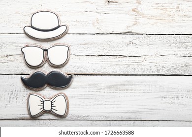 Happy father's day concept. Cookies on a wooden background. Place for text - Powered by Shutterstock