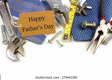 Happy Fathers Day Gift Tag With Border Of Tools And Ties On A White Background