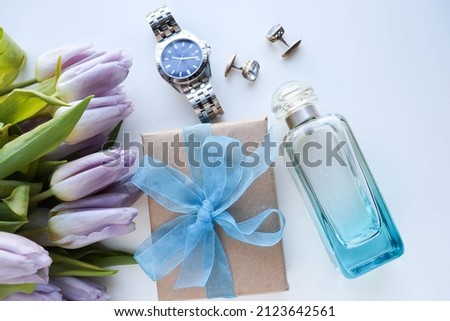 Happy father's day greeting card . set of men's accessories. watches, cufflinks, gift box and cologne. gift concept for men