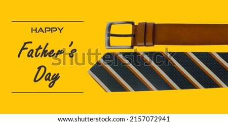 Happy Father's Day poster or banner with tan leather belt and striped pattern tie on a yellow background, Greetings and presents for Father's Day on flat lay backrop, Promotion and shopping template