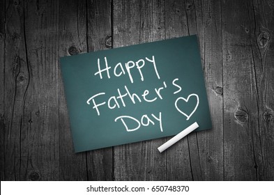 Happy fathers day sign on wooden boards background - Powered by Shutterstock