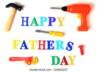 Happy Fathers Day Spelled Out In Toy Letters And Tools.