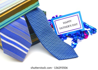 Happy Fathers Day Tag With Gift Box And Ties Over White