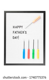 Happy Fathers Day Text On Letter Board Isolated On White. Minimal Framed Text With Colored Screwdrivers. Copy Space. Mockup Or Template Poster For Father's Day Sale