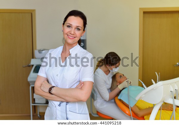 Happy Female Dentist White Coat Dental库存照片441095218 Shutterstock 0293