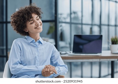 Happy female designer standing in office - Powered by Shutterstock