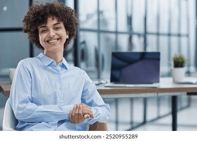 Happy female designer standing in office - Powered by Shutterstock