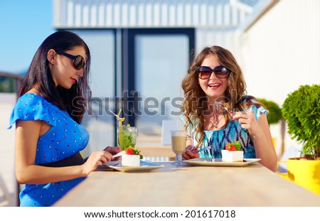 Similar – Young women couple drinking healthy drinks outdoors