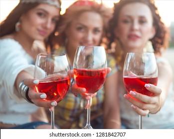 Happy Female Friends With Glass Of Rose Wine On Summer Beach Picnic 