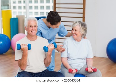 Happy Female Instructor Senior Couple Gym Stock Photo 256043884 ...