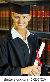 Happy Female Law School Graduate In University Library