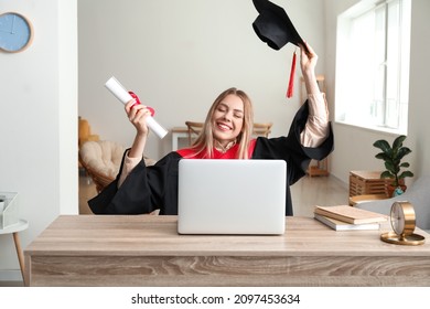 Happy female student on her graduation day at home. Concept of online education - Shutterstock ID 2097453634