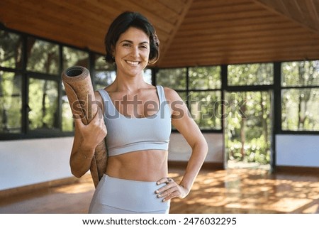 Similar – Image, Stock Photo Young woman trainer teaching the different exercises to a student while they exercise with a smile.