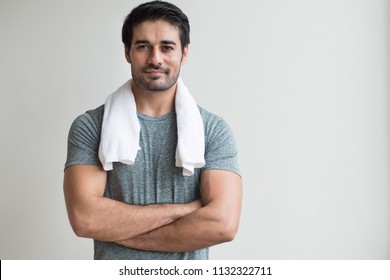 Happy Fitness Man Working Out In Gym; Portrait Of Happy, Smiling, Positive Asian Indian Man Body Training, Working Out In Fitness Gym; South Asian, North Indian Adult Man Model