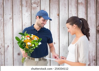 Happy Flower Delivery Man With Customer Against Wooden Planks