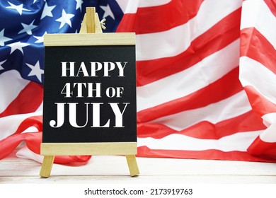 Happy Forth Of July Independence Day Text Messege  With USA Flag On Wooden Background