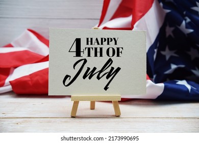 Happy Forth Of July Independence Day Text Messege  With USA Flag On Wooden Background