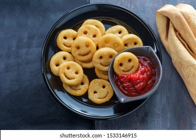 Happy French Fried Potato Smiley Faces With Ketchup