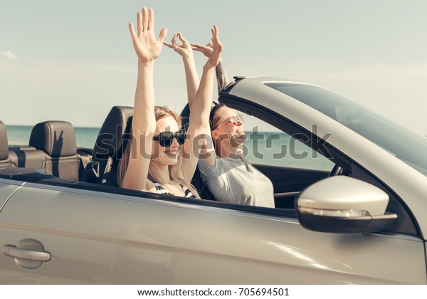 Happy friends in\
car