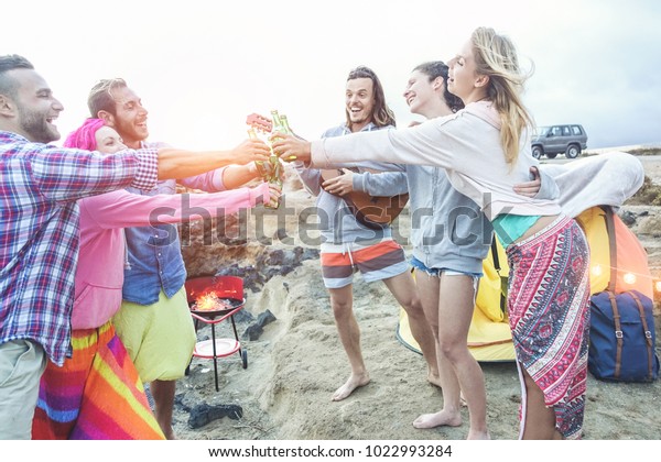 Happy Friends Cheering Beers Barbecue Dinner | People Stock Happy Friends Cheering Beers Barbecue Dinner | People Stock