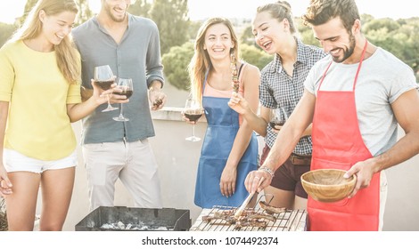Happy Friends Cooking And Drinking Wine At Patio Barbecue Dinner - Trendy People Preparing Meat With Bbq Sauce - Youth Lifestyle, Food, Friendship And Summer Concept - Main Focus On Right Girl Face