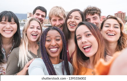 Happy Friends From Diverse Cultures And Races Taking Photo Making Funny Faces - Youth, Millennial Generation And Friendship Concept With Young People Having Fun Together