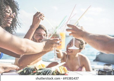 Happy Friends Drinking Tropical Cocktails At Boat Party And Eating Pineapple - Young People Having Fun In Sea Excursion - Youth And Summer Concept - Main Focus On Left Bottom Hand Glass - Retro Filter