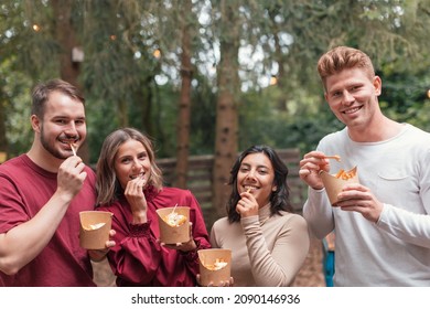 Happy Friends Eating French Fries - Belgian International Food