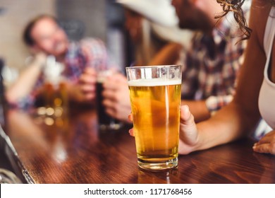 Happy Friends Having Fun At Bar - Young Trendy People Drinking Beer And Laughing Together