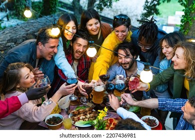 Happy Friends Having Fun Drinking At House Dinner Pic Nic Bbq Party - Mixed Age Range People Toasting Drinks At Fancy Restaurant Garden Together - Young Men And Women Having Fun Moment Drinking Wine 