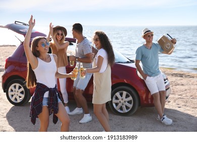 Happy Friends Having Fun Near Car On Beach. Summer Trip