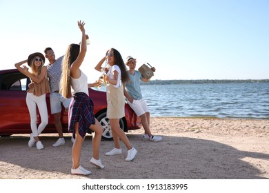 Happy Friends Having Fun Near Car On Beach. Summer Trip