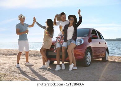 Happy Friends Having Fun Near Car On Beach. Summer Trip