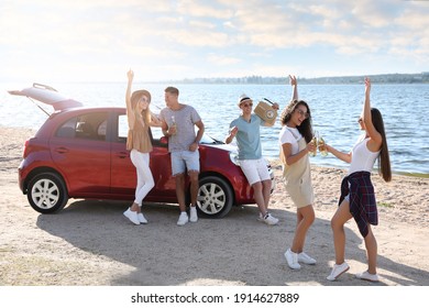 Happy Friends Having Fun Near Car On Beach. Summer Trip