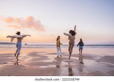 Happy friends having fun and running at the sunset - Powered by Shutterstock