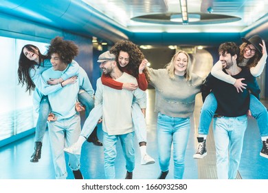 Happy Friends Having Fun In Underground Metropolitan Station - Young People Going Out For Party Night - Friendship, Happiness And Youth Concept - Soft Focus On Man Face Wearing Hat