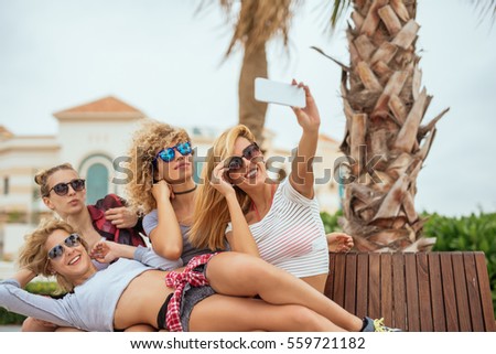 Similar – Young women couple drinking healthy drinks outdoors