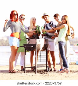 Happy Friends On Rest At Beach