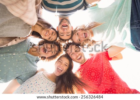 Similar – Young people with their heads together having fun