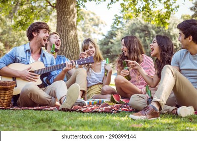 Happy friends in the park on a sunny day - Shutterstock ID 290399144