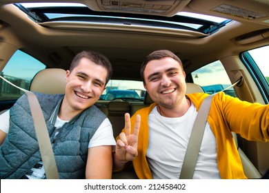 Happy Friends Ready For Vacations Driving Car