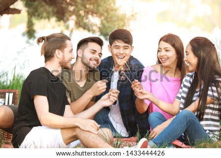 Similar – Man with piece of cake in a summer barbecue