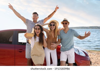 Happy Friends Taking Selfie Near Car On Beach. Summer Trip