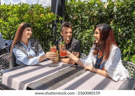 Similar – Group of people having fun in a summer day