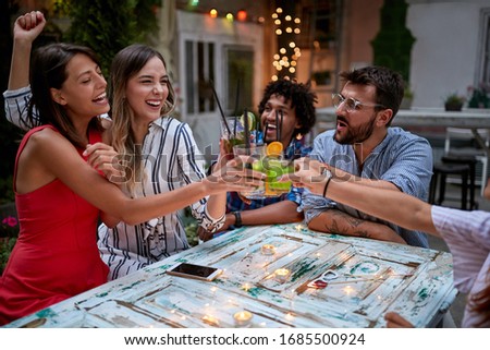 Similar – Freunde essen Kuchen und haben Spaß auf der Party.