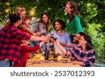 Happy friends toasting red wine glasses at farm house vineyard countryside - Young people having fun together outdoors